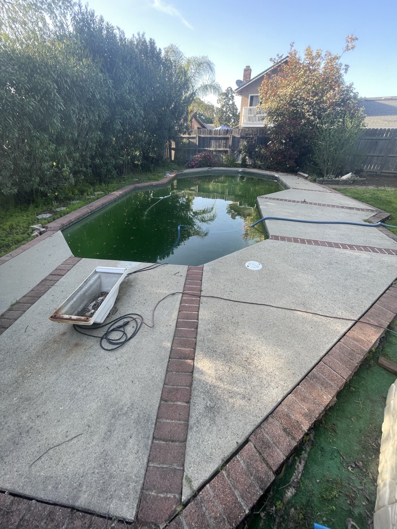 The same pool deck before resurfacing